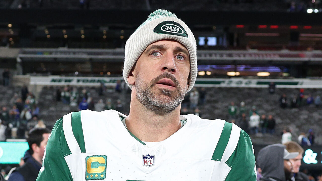 EAST RUTHERFORD, NEW JERSEY - OCTOBER 14: Aaron Rodgers #8 of the New York Jets walks on the field after the game against the Buffalo Bills at MetLife Stadium on October 14, 2024 in East Rutherford, New Jersey.