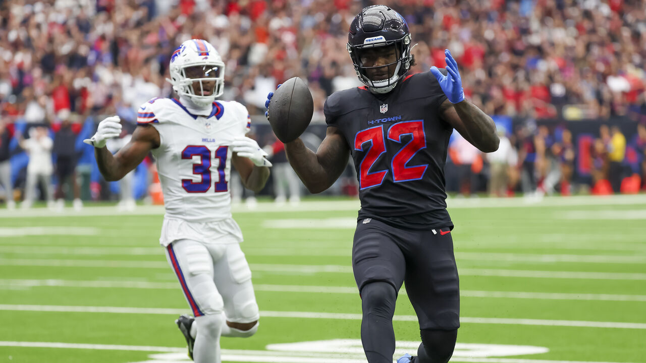 HOUSTON, TX - OCTOBER 06: Houston Texans running back Cam Akers (22) runs to the end zone to score a touchdown in the first quarter during the NFL game between the Buffalo Bills and Houston Texans on October 6, 2024 at NRG Stadium in Houston, Texas.