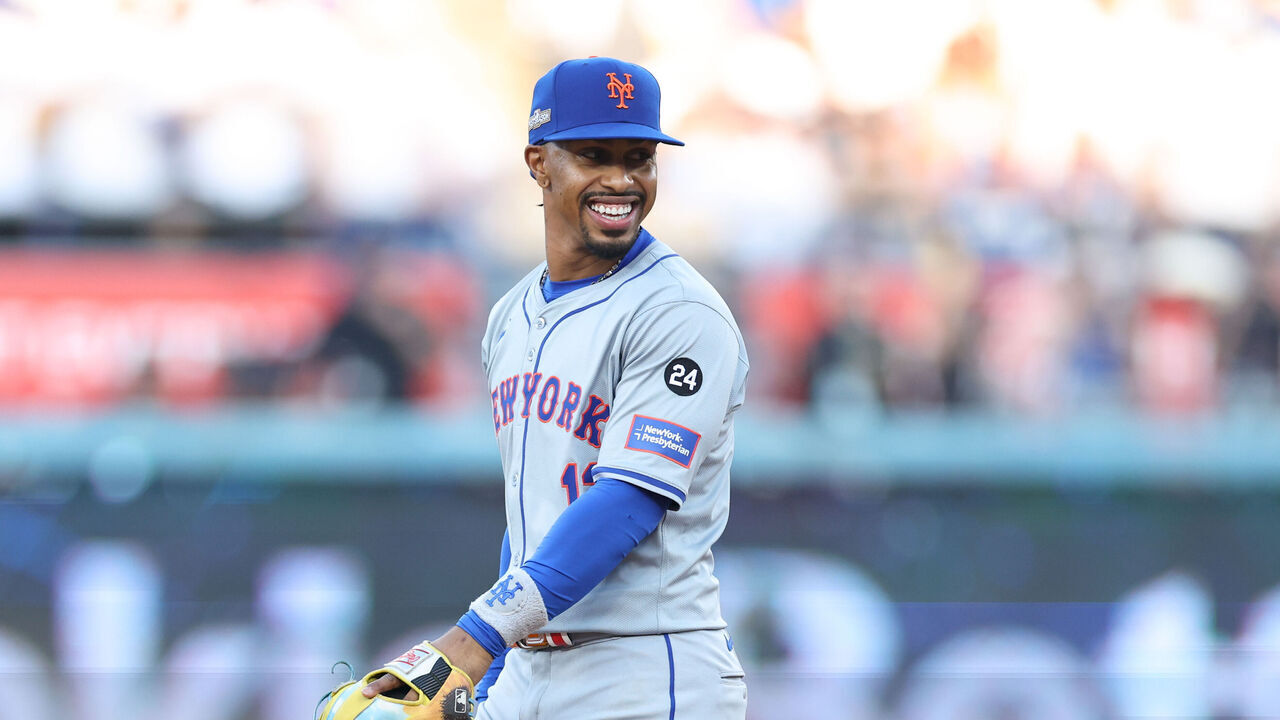 LOS ANGELES, CA - OCTOBER 13: Francisco Lindor #12 of the New York Mets smiles as he takes the field prior to Game 1 of the NLCS between the New York Mets and the Los Angeles Dodgers at Dodger Stadium on Sunday, October 13, 2024 in Los Angeles, California.