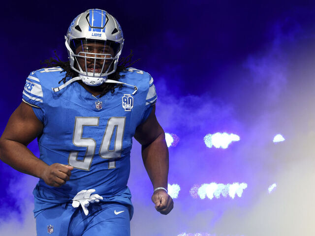 DETROIT, MI - JANUARY 21: Alim McNeill #54 of the Detroit Lions runs onto the field prior to an NFL divisional round playoff football game against the Tampa Bay Buccaneers at Ford Field on January 21, 2024 in Detroit, Michigan.
