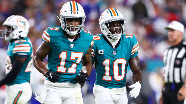 MIAMI GARDENS, FLORIDA - SEPTEMBER 12: Jaylen Waddle #17 and Tyreek Hill #10 of the Miami Dolphins looks on during the first quarter of the game against the Buffalo Bills at Hard Rock Stadium on September 12, 2024 in Miami Gardens, Florida.