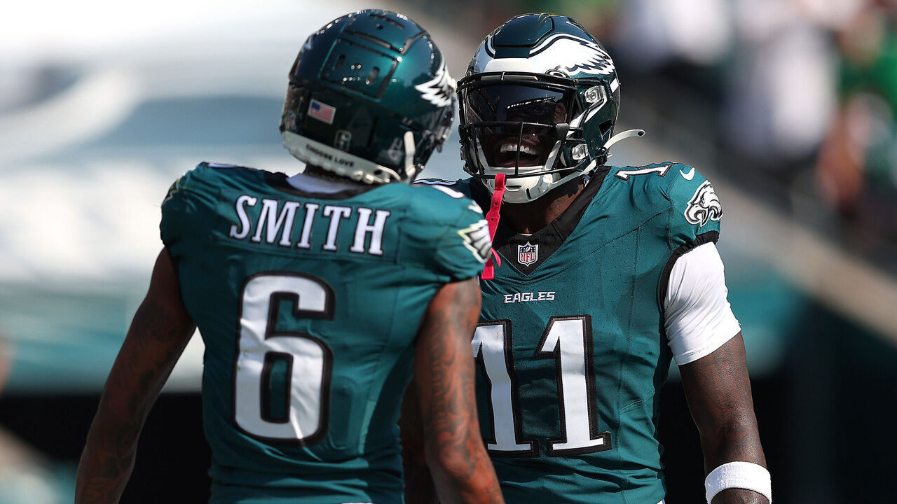 PHILADELPHIA, PENNSYLVANIA - OCTOBER 13: A.J. Brown #11 of the Philadelphia Eagles celebrates scoring a touchdown with teammate DeVonta Smith #6 during the second quarter against the Cleveland Browns at Lincoln Financial Field on October 13, 2024 in Philadelphia, Pennsylvania.