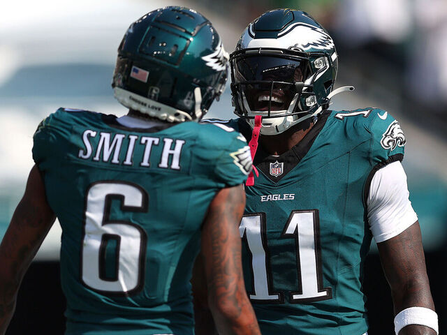 PHILADELPHIA, PENNSYLVANIA - OCTOBER 13: A.J. Brown #11 of the Philadelphia Eagles celebrates scoring a touchdown with teammate DeVonta Smith #6 during the second quarter against the Cleveland Browns at Lincoln Financial Field on October 13, 2024 in Philadelphia, Pennsylvania.