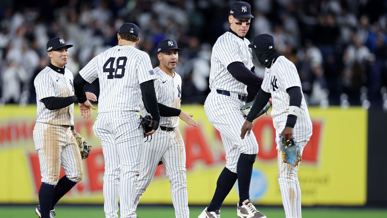 NEW YORK, NEW YORK - OCTOBER 15: (L-R) Anthony Volpe #11, Anthony Rizzo #48, Gleyber Torres #25, Aaron Judge #99 and Jazz Chisholm Jr. #13 of the New York Yankees celebrate their 6-3 win against the Cleveland Guardians in Game Two of the American League Championship Series at Yankee Stadium on October 15, 2024 in New York City.