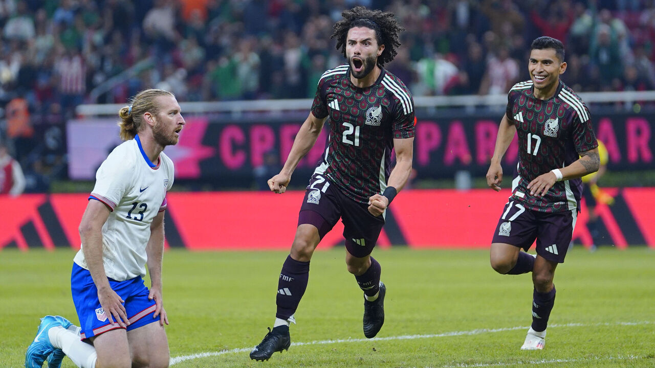 ZAPOPAN, MEXICO - OCTOBER 15: Cesar Huerta of Mexico celebrates with teammates after scoring the team's second goal during a friendly match between Mexico and the United States at Akron Stadium on October 15, 2024 in Zapopan, Mexico.