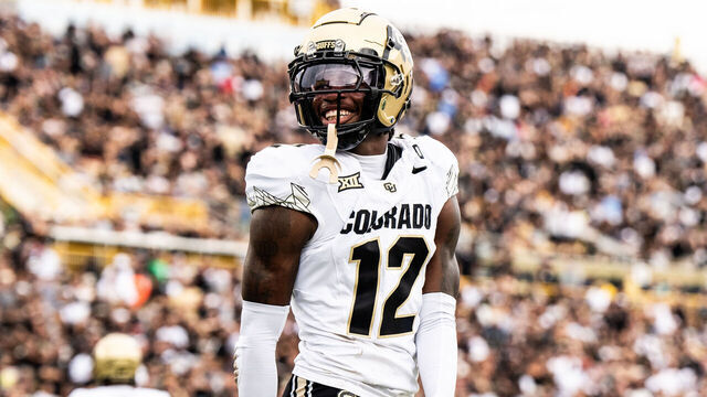 ORLANDO, FLORIDA - SEPTEMBER 28: Travis Hunter #12 of the Colorado Buffaloes smiles after a play against the UCF Knights at FBC Mortgage Stadium on September 28, 2024 in Orlando, Florida.