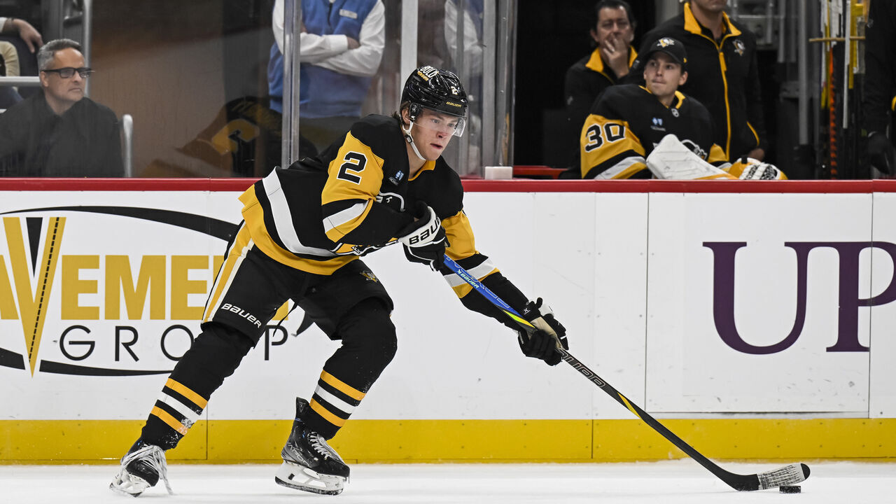 PITTSBURGH, PA - OCTOBER 09: Pittsburgh Penguins right wing Rutger McGroarty (2) handles the puck during the third period in the NHL game between the Pittsburgh Penguins and the New York Rangers on October 9, 2024, at PPG Paints Arena in Pittsburgh, PA.
