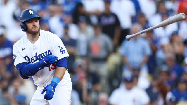 LOS ANGELES, CALIFORNIA - OCTOBER 14: Max Muncy #13 of the Los Angeles Dodgers reacts to his walk as the plays the New York Mets in the eighth inning during Game Two of the Championship Series at Dodger Stadium on October 14, 2024 in Los Angeles, California.
