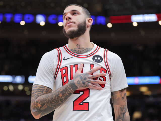 CHICAGO, IL - OCTOBER 16: Chicago Bulls guard Lonzo Ball (2) reacts to the crowd as he enters during the first half of a preseason game against the Minnesota Timberwolves on October 16, 2024 at the United Center in Chicago, Illinois.