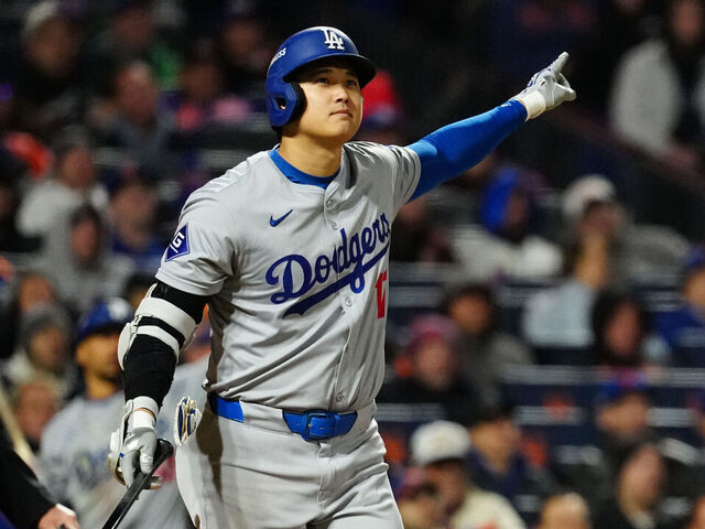NEW YORK, NY - OCTOBER 16: Shohei Ohtani #17 of the Los Angeles Dodgers reacts after hitting a three RBI home run in the eighth inning during Game 3 of the NLCS presented by loanDepot between the Los Angeles Dodgers and the New York Mets at Citi Field on Wednesday, October 16, 2024 in New York, New York.
