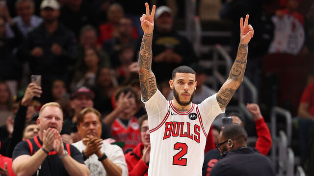 CHICAGO, ILLINOIS - OCTOBER 16: Lonzo Ball #2 of the Chicago Bulls acknowledges the crowd as he enters the preseason game against the Minnesota Timberwolves at the United Center on October 16, 2024 in Chicago, Illinois.