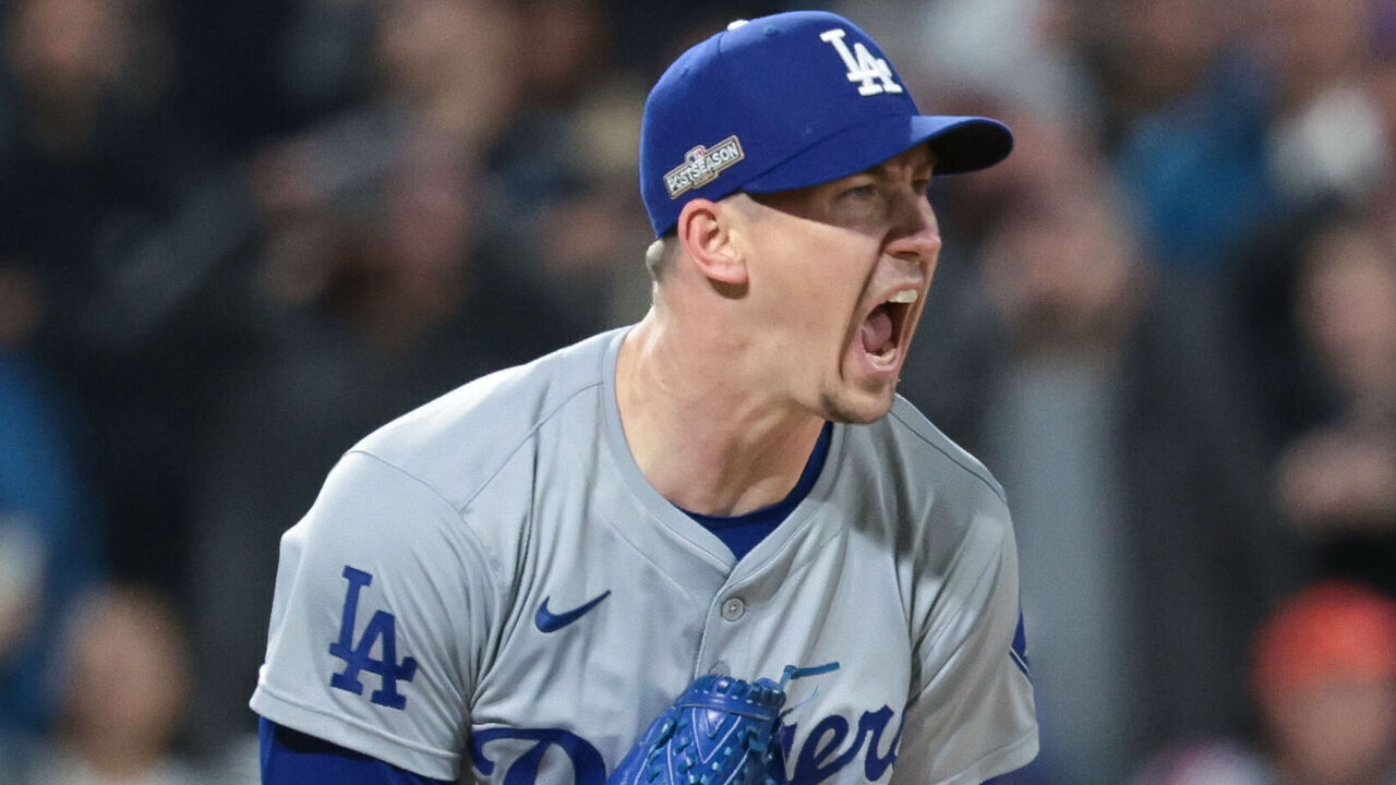 NEW YORK, NEW YORK - OCTOBER 16: Walker Buehler #21 of the Los Angeles Dodgers reacts after a inning ending strikeout to Francisco Lindor #12 of the New York Mets during the second inning in game three of the National League Championship Series at Citi Field on Wednesday, Oct. 16, 2024 in New York. (Wally Skalij / Los Angeles Times via Getty Images)