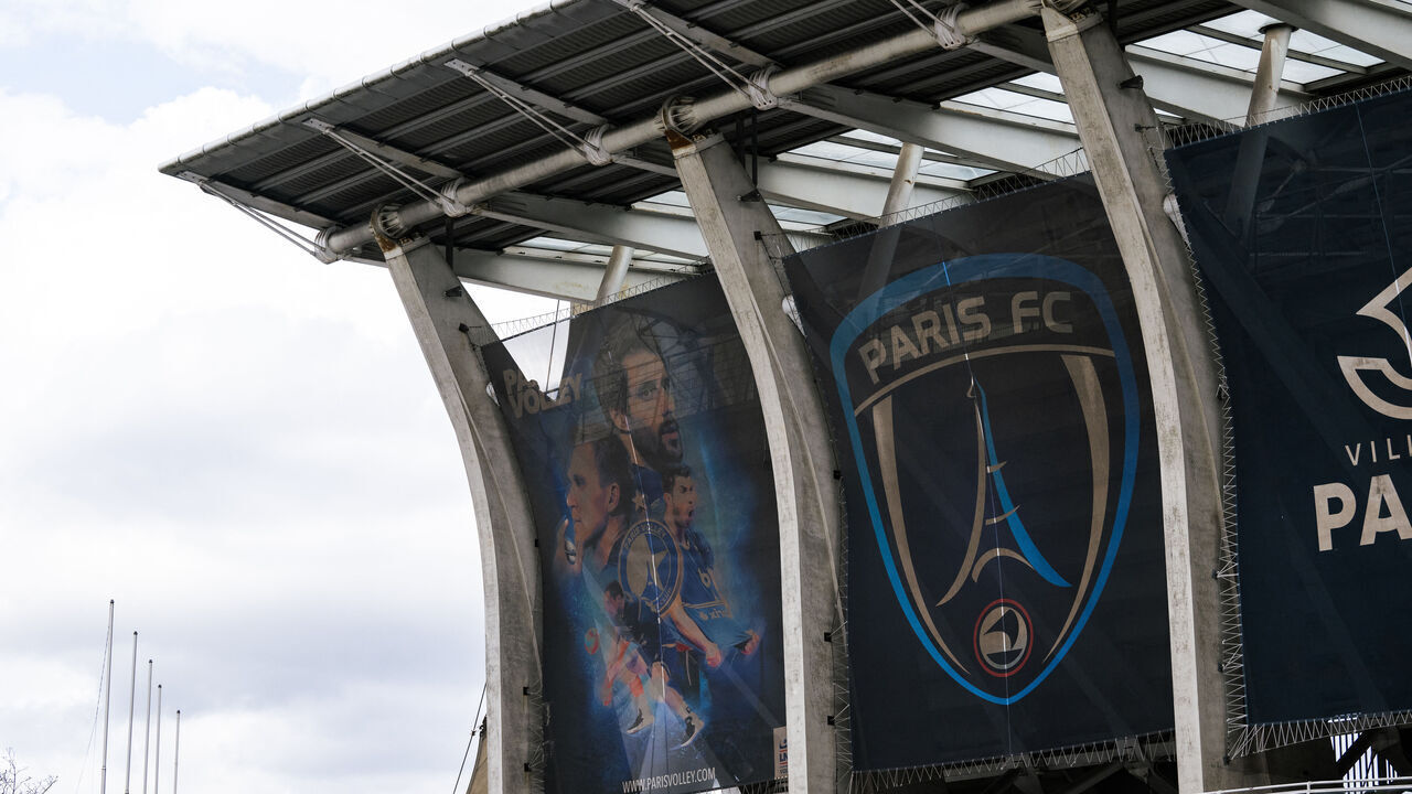 This photograph taken in Paris on March 18, 2024 shows the logo of the Paris FC at the Charlety stadium.
