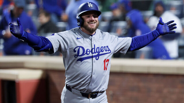 NEW YORK, NEW YORK - OCTOBER 16: Max Muncy #13 of the Los Angeles Dodgers celebrates while headed to the dugout after a solo home run during the ninth inning in game three of the National League Championship Series against the New York Mets at Citi Field on Wednesday, Oct. 16, 2024 in New York. (Robert Gauthier / Los Angeles Times via Getty Images)