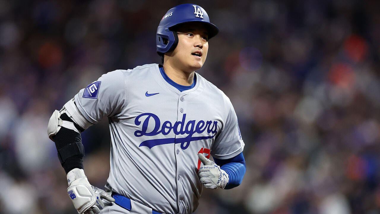 NEW YORK, NEW YORK - OCTOBER 17: Shohei Ohtani #17 of the Los Angeles Dodgers runs the bases after hitting a home run during the first inning against the New York Mets during Game Four of the National League Championship Series at Citi Field on October 17, 2024 in New York City.