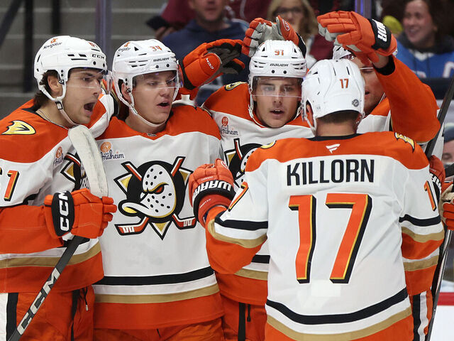 DENVER, COLORADO - OCTOBER 18: Cutter Gauthier #61, Pavel Mintyukov #34, Brian Dumoulin #6, and Alex Killorn #17 of the Anaheim Ducks celebrate a goal by Leo Carlsson #91 against the Colorado Avalanche in the first period at Ball Arena on October 18, 2024 in Denver, Colorado.