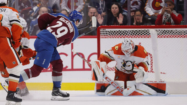 DENVER, COLORADO - OCTOBER 18: Nathan MacKinnon #29 of the Colorado Avalanche shoots and scores the game winning goal against goaltender Lukas Dostal #1 of the Anaheim Ducks at Ball Arena on October 18, 2024 in Denver, Colorado. The Avalanche defeated the Ducks 4-3 in overtime.