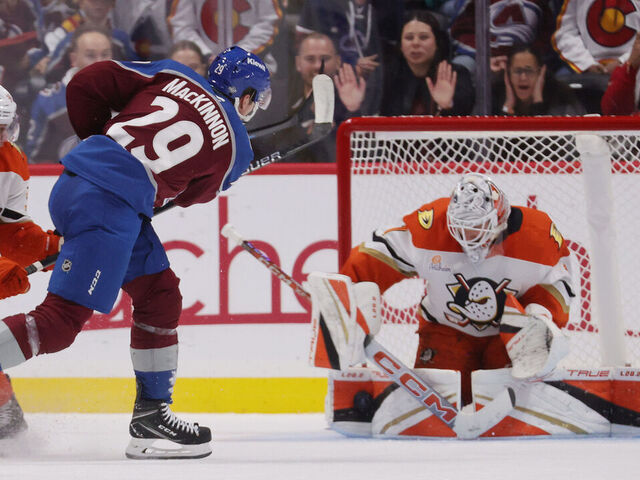 DENVER, COLORADO - OCTOBER 18: Nathan MacKinnon #29 of the Colorado Avalanche shoots and scores the game winning goal against goaltender Lukas Dostal #1 of the Anaheim Ducks at Ball Arena on October 18, 2024 in Denver, Colorado. The Avalanche defeated the Ducks 4-3 in overtime.