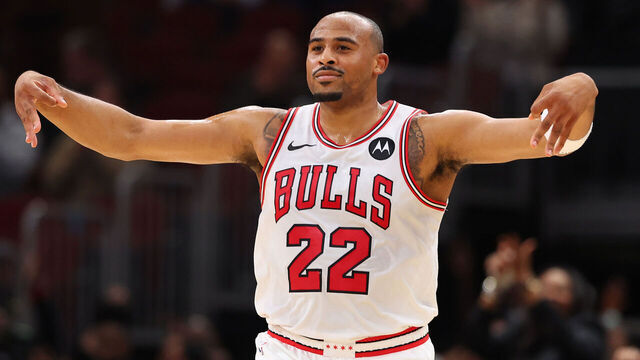 CHICAGO, ILLINOIS - OCTOBER 16: Talen Horton-Tucker #22 of the Chicago Bulls celebrates a three pointer by Jevon Carter #5 (not pictured) against the Minnesota Timberwolves during the second half of a preseason game at the United Center on October 16, 2024 in Chicago, Illinois.