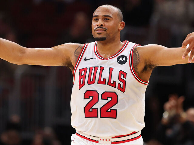 CHICAGO, ILLINOIS - OCTOBER 16: Talen Horton-Tucker #22 of the Chicago Bulls celebrates a three pointer by Jevon Carter #5 (not pictured) against the Minnesota Timberwolves during the second half of a preseason game at the United Center on October 16, 2024 in Chicago, Illinois.