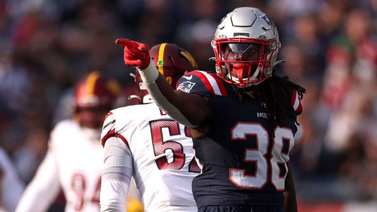 FOXBOROUGH, MASSACHUSETTS - NOVEMBER 05: Rhamondre Stevenson #38 of the New England Patriots reacts after a first down during the first quarter in the game against the Washington Commanders at Gillette Stadium on November 05, 2023 in Foxborough, Massachusetts.