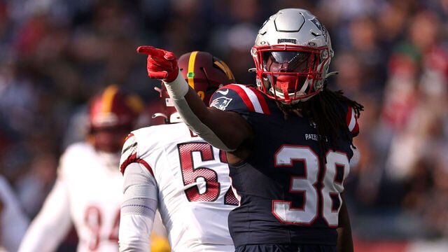 FOXBOROUGH, MASSACHUSETTS - NOVEMBER 05: Rhamondre Stevenson #38 of the New England Patriots reacts after a first down during the first quarter in the game against the Washington Commanders at Gillette Stadium on November 05, 2023 in Foxborough, Massachusetts.