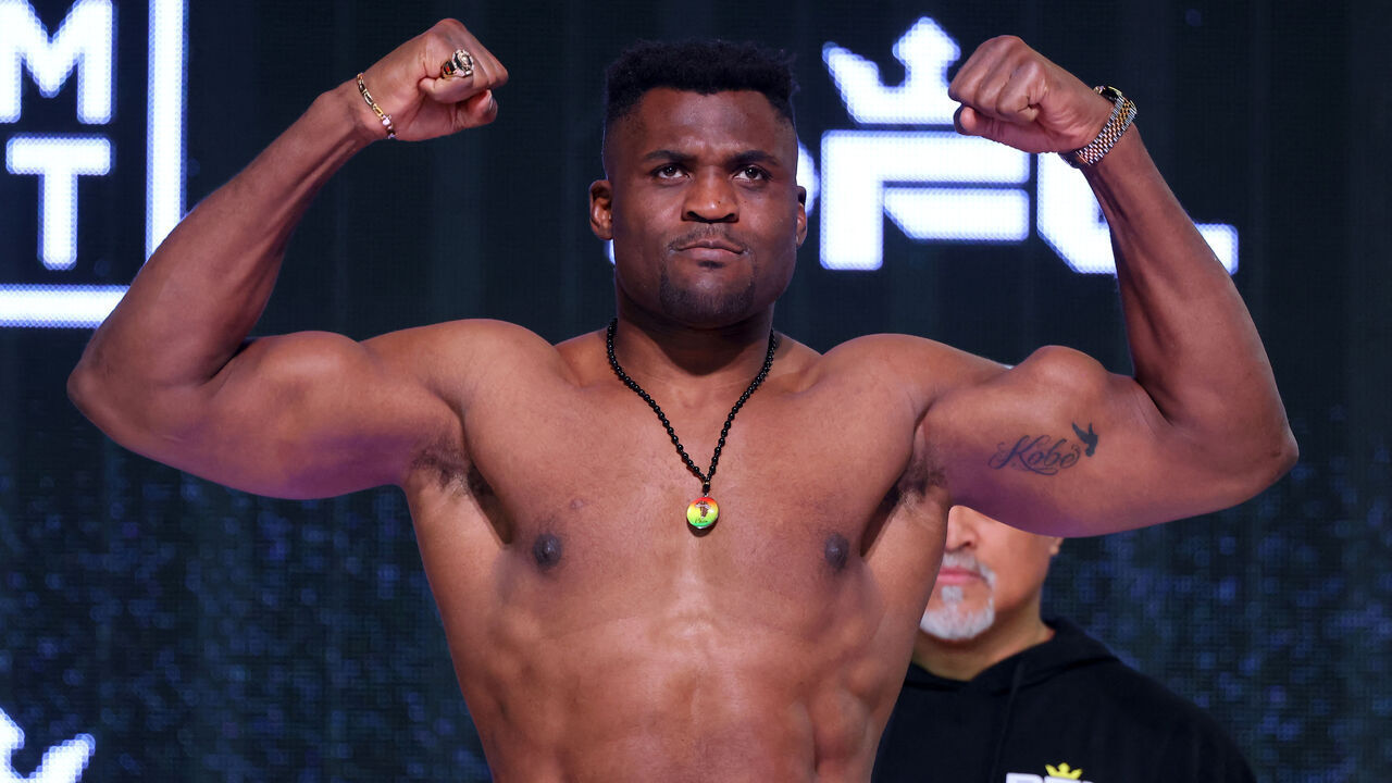Cameroon's Francis Ngannou gestures during a weigh-in in Riyadh on October 18, 2024, ahead of tomorrow's PFL Super Fight "Battle of the Giants's" mixed martial arts bout against Brazil's Renan Ferreira.