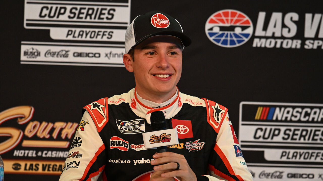 LAS VEGAS, NV - OCTOBER 19: Christopher Bell (#20 Joe Gibbs Racing Rheem Toyota) talks with the media after taking the pole for the South Point 400 NASCAR Cup Series playoff race on October 19, 2024, at Las Vegas Motor Speedway in Las Vegas, NV.