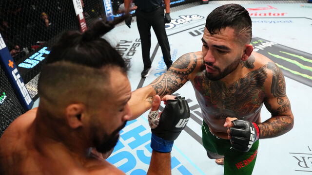 LAS VEGAS, NEVADA - OCTOBER 19: (R-L) Anthony Hernandez punches Michel Pereira of Brazil in a middleweight fight during the UFC Fight Night event at UFC APEX on October 19, 2024 in Las Vegas, Nevada.