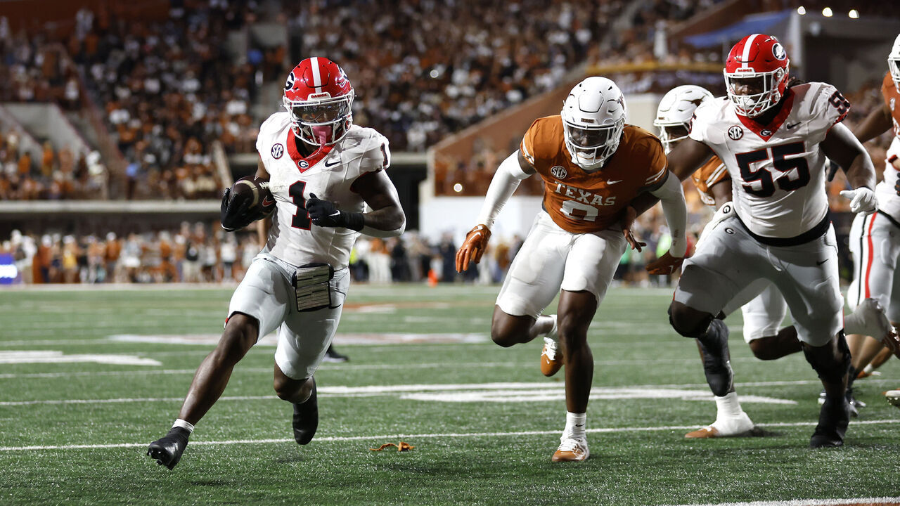 AUSTIN, TEXAS - OCTOBER 19: Trevor Etienne #1 of the Georgia Bulldogs runs the ball for a touchdown during the first quarter against the Texas Longhorns at Darrell K Royal-Texas Memorial Stadium on October 19, 2024 in Austin, Texas.