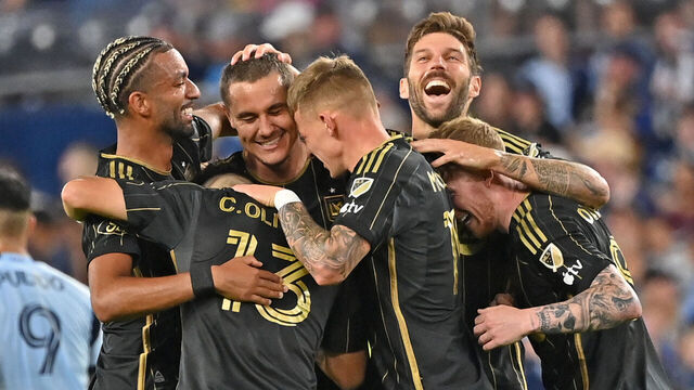 KANSAS CITY, KS - OCTOBER 05: Aaron Long (C) of Los Angeles FC celebrates with his teammates after scoring a goal in the second half against Sporting Kansas City on October 5, 2024 at Children's Mercy Park in Kansas City, Kansas.
