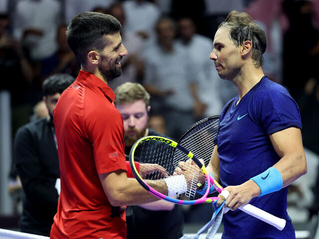 RIYADH, SAUDI ARABIA - OCTOBER 19: Novak Djokovic of Serbia (left) shakes hands with Rafael Nadal of Spain after defeating him to win the Men's Singles Third Place Playoff match on day three of the Six Kings Slam 2024 at Kingdom Arena on October 19, 2024 in Riyadh, Saudi Arabia.