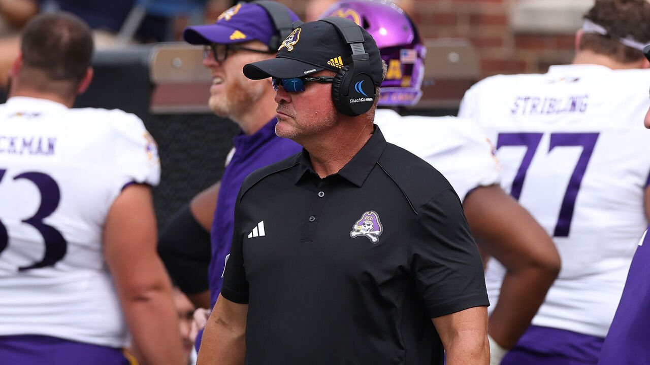 ANN ARBOR, MICHIGAN - SEPTEMBER 02: Head coach Mike Houston of the East Carolina Pirates looks on in the second half while playing the Michigan Wolverines at Michigan Stadium on September 02, 2023 in Ann Arbor, Michigan.