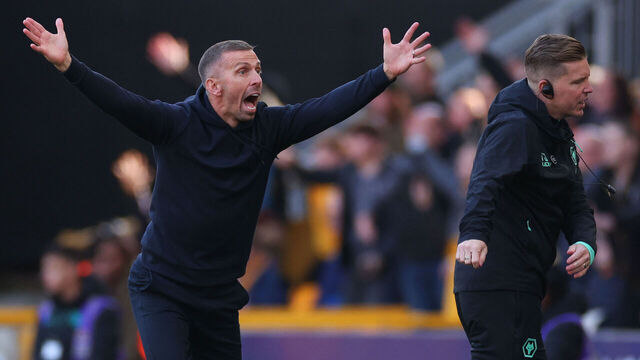 WOLVERHAMPTON, ENGLAND - OCTOBER 20: Gary O'Neil manager / head coach of Wolverhampton Wanderers and Assistant Tim Jenkins react as Pep Guardiola manager of Manchester City looks on during the Premier League match between Wolverhampton Wanderers FC and Manchester City FC at Molineux on October 20, 2024 in Wolverhampton, England.