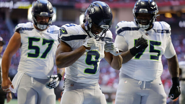 ATLANTA, GEORGIA - OCTOBER 20: Kenneth Walker III #9 of the Seattle Seahawks celebrates a touchdown during the third quarter against the Atlanta Falcons at Mercedes-Benz Stadium on October 20, 2024 in Atlanta, Georgia.