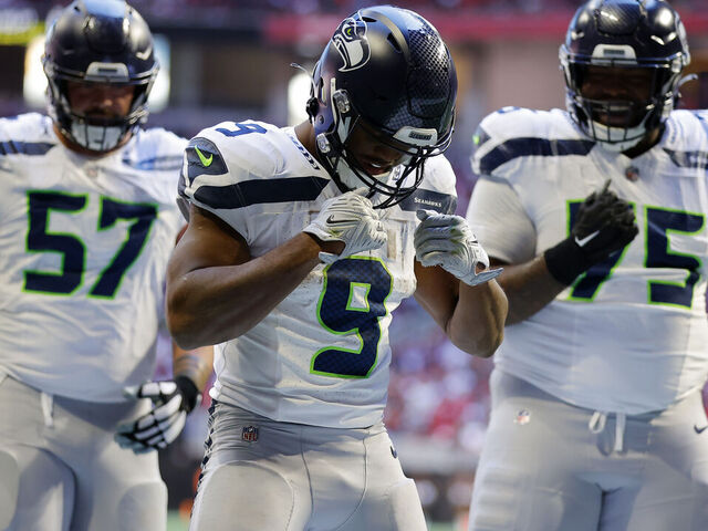 ATLANTA, GEORGIA - OCTOBER 20: Kenneth Walker III #9 of the Seattle Seahawks celebrates a touchdown during the third quarter against the Atlanta Falcons at Mercedes-Benz Stadium on October 20, 2024 in Atlanta, Georgia.