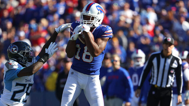 ORCHARD PARK, NEW YORK - OCTOBER 20: Amari Cooper #18 of the Buffalo Bills makes a catch against the Tennessee Titans during the third quarter at Highmark Stadium on October 20, 2024 in Orchard Park, New York.