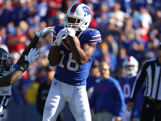 ORCHARD PARK, NEW YORK - OCTOBER 20: Amari Cooper #18 of the Buffalo Bills makes a catch against the Tennessee Titans during the third quarter at Highmark Stadium on October 20, 2024 in Orchard Park, New York.