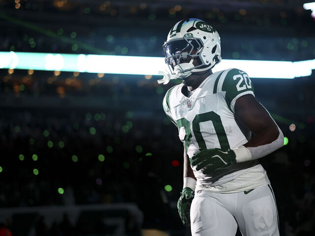 EAST RUTHERFORD, NEW JERSEY - OCTOBER 14: Breece Hall #20 of the New York Jets runs onto the field prior to an NFL game against the Buffalo Bills at MetLife Stadium on October 14, 2024 in East Rutherford, New Jersey.