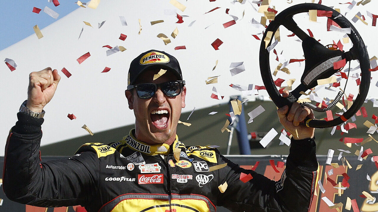 LAS VEGAS, NEVADA - OCTOBER 20: Joey Logano, driver of the #22 Pennzoil Ford, celebrates in victory lane after winning the NASCAR Cup Series South Point 400 at Las Vegas Motor Speedway on October 20, 2024 in Las Vegas, Nevada.