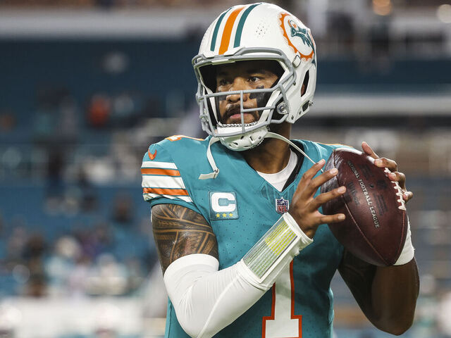 MIAMI GARDENS, FL - SEPTEMBER 12: Tua Tagovailoa #1 of the Miami Dolphins warms up prior to an NFL football game against the Buffalo Bills at Hard Rock Stadium on September 12, 2024 in Miami Gardens, FL.