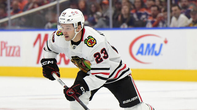 EDMONTON, CANADA OCTOBER 12: Philipp Kurashev #23 of the Chicago Blackhawks in action against the Edmonton Oilers during the game at Rogers Place on October 12, 2024, in Edmonton, Alberta, Canada.
