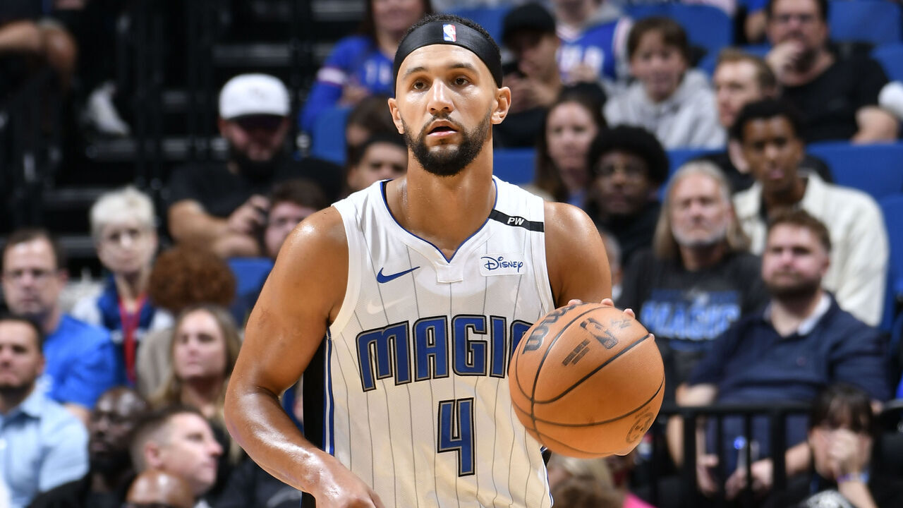 ORLANDO, FL - OCTOBER 18: Jalen Suggs #4 of the Orlando Magic dribbles the ball during the game against the Philadelphia 76ers during a NBA preseason game on October 18, 2024 at Kia Center in Orlando, Florida. Mandatory Copyright Notice: Copyright 2024 NBAE