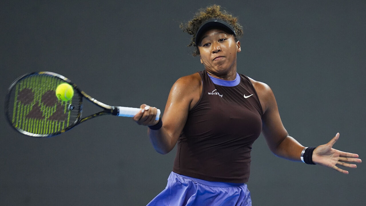 BEIJING, CHINA - OCTOBER 01: Naomi Osaka of Japan returns a shot in the Women's Singles Fourth Round against Coco Gauff of the United States during day nine of the 2024 China Open at National Tennis Center on October 01, 2024 in Beijing, China.