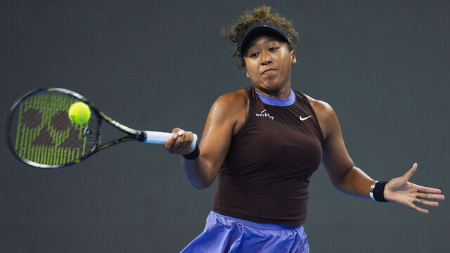 BEIJING, CHINA - OCTOBER 01: Naomi Osaka of Japan returns a shot in the Women's Singles Fourth Round against Coco Gauff of the United States during day nine of the 2024 China Open at National Tennis Center on October 01, 2024 in Beijing, China.