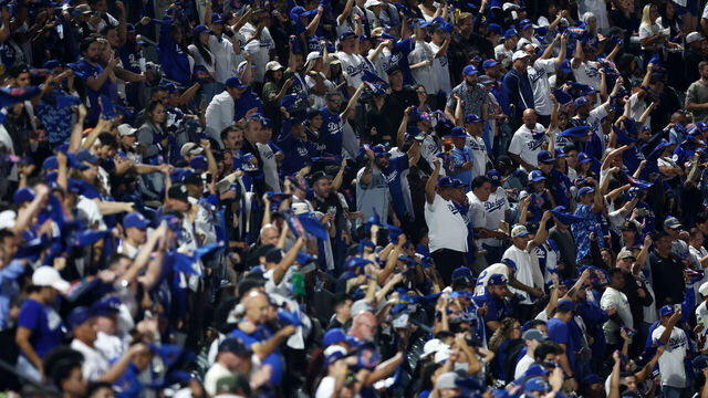 LOS ANGELES, CALIFORNIA - OCTOBER 20: Los Angeles Dodgers fans cheer during Game Six of the National League Championship Series against the New York Mets at Dodger Stadium on October 20, 2024 in Los Angeles, California.