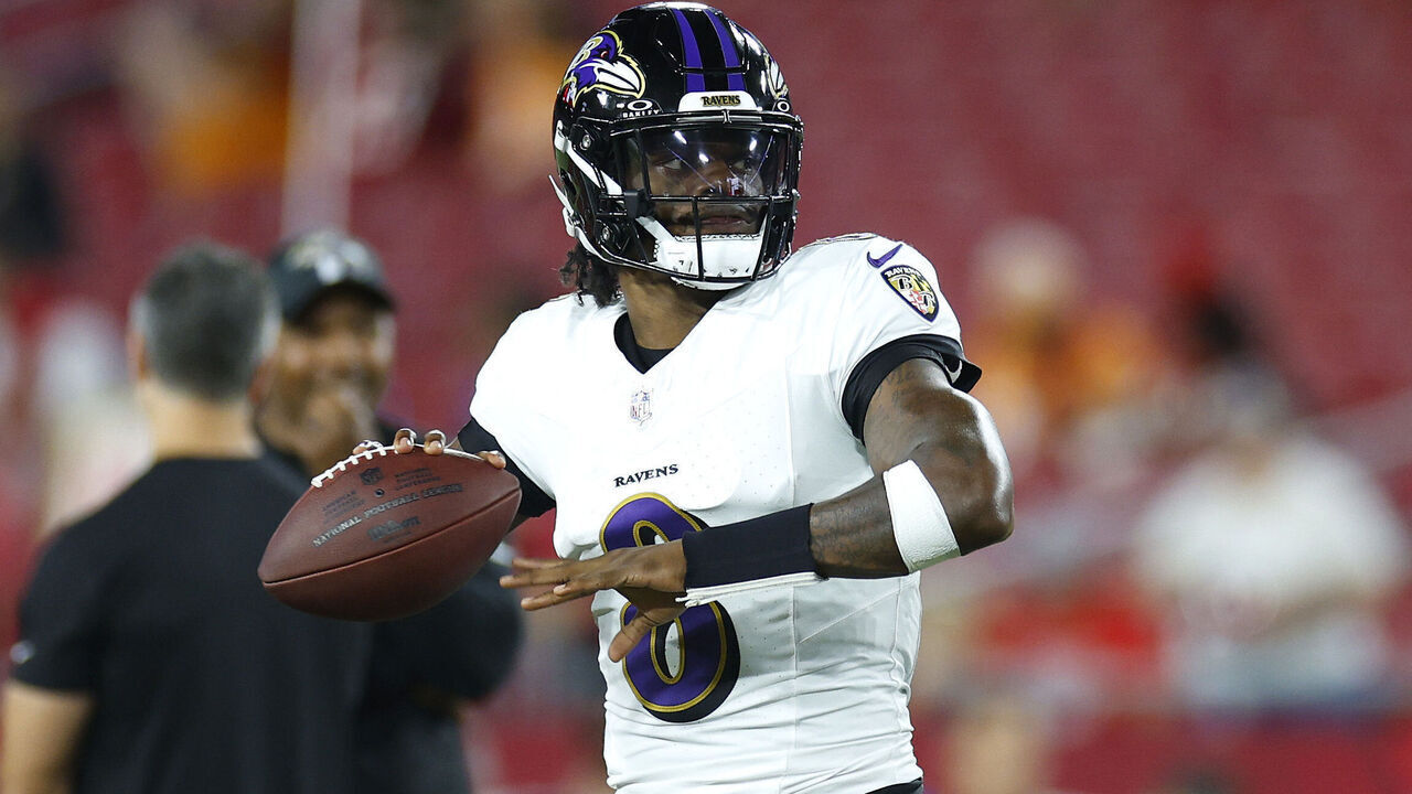 TAMPA, FLORIDA - OCTOBER 21: Lamar Jackson #8 of the Baltimore Ravens warms up prior to a game against the Tampa Bay Buccaneers at Raymond James Stadium on October 21, 2024 in Tampa, Florida.