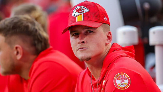 KANSAS CITY, MISSOURI - SEPTEMBER 5: Bailey Zappe, #19 for the Kansas City Chiefs, watches pregame warmups prior to the regular season game against the Baltimore Ravens at GEHA Field at Arrowhead Stadium on September 5, 2024 in Kansas City, Missouri.