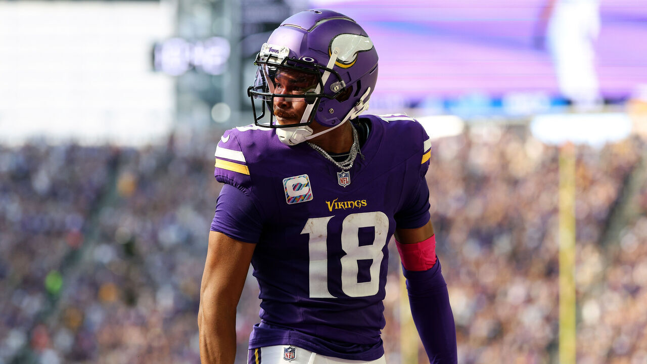 MINNEAPOLIS, MINNESOTA - OCTOBER 20: Justin Jefferson #18 of the Minnesota Vikings celebrates his touchdown against the Detroit Lions in the third quarter at U.S. Bank Stadium on October 20, 2024 in Minneapolis, Minnesota. The Lions defeated the Vikings 31-29.