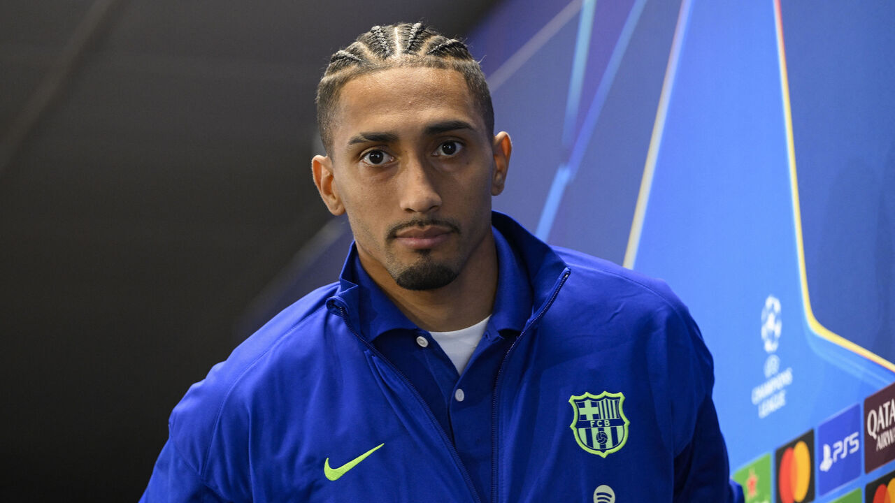 Barcelona's Brazilian forward #11 Raphinha arrives to give a press conference at the Joan Gamper training ground in Sant Joan Despi, near Barcelona, on October 22, 2024, on the eve of the UEFA Champions League, league phase day 3 football match between FC Barcelona and FC Bayern Munich.